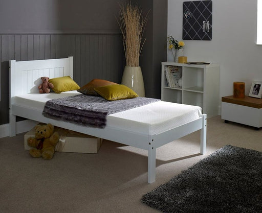 Sleek white wooden single bed.